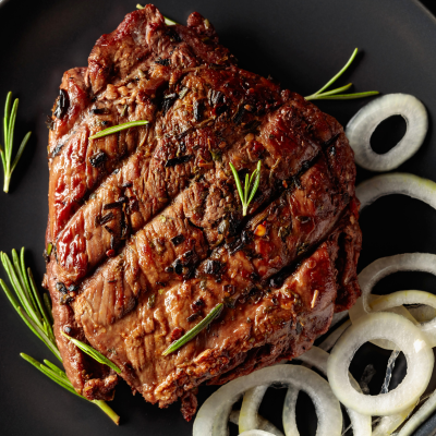 Beef Steak with Black Olive Sauce