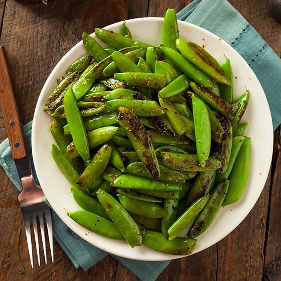 Spicy Peas with Chili Oil, Pesto and Pine Nuts